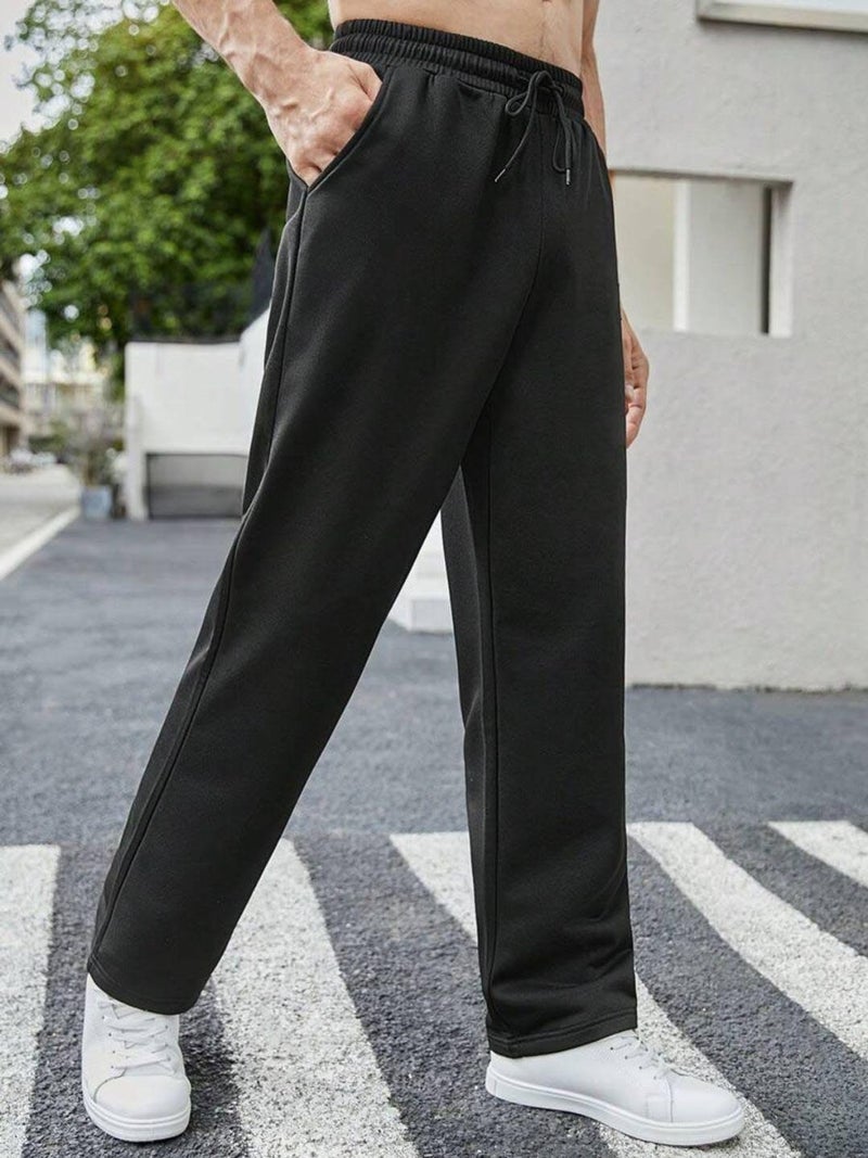 فلاينوف بنطلون رياضي رجالي أسود سادة بقصة فضفاضة - Image 2